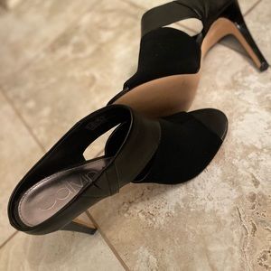 Black Calvin Klein mules